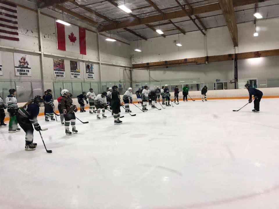 SWHC Try Hockey for Free participants run skating drills