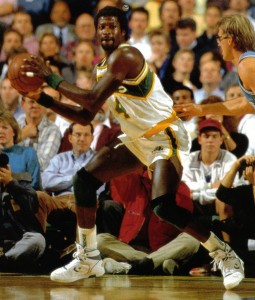 Michael Cage dominating the the paint like a real man.  He was called the Windex Man for his pension of cleaning the glass.